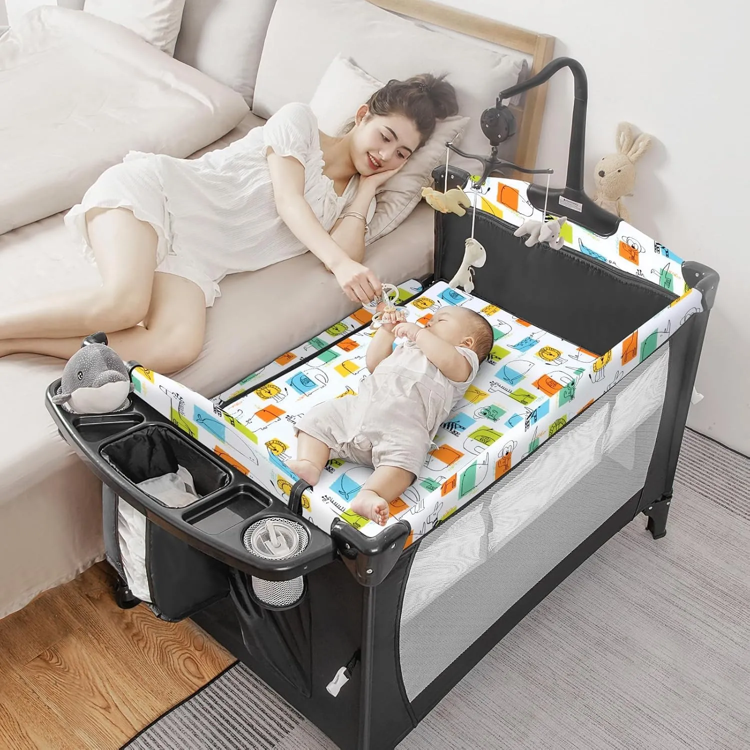 5-in-1 Pack and Play, Baby Bassinet Bedside Sleeper with U-Shaped Diaper Changer, Portable Toddler Playard for Newborn Toddlers, Baby Crib with 4 Adjustable Height, Carry Bag,Easy to Install (Cartoon)