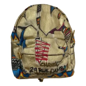 Chanel gold cloth backpacks