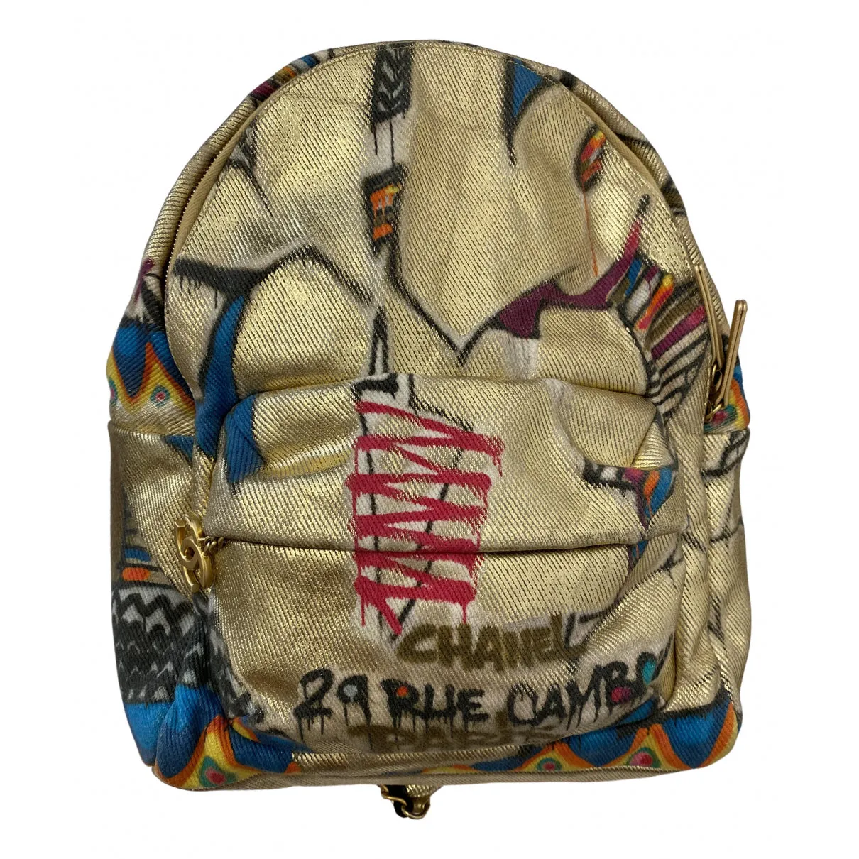 Chanel gold cloth backpacks